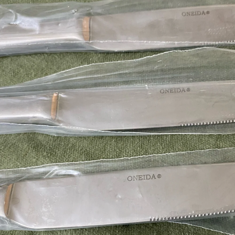 Oneida knives set of three brand new still in sleeves